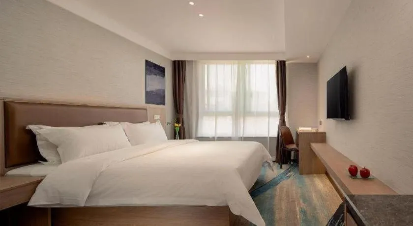 Bed in GreenTree Inn Ganzhou Sankang Temple DaRunFa Express Hotel