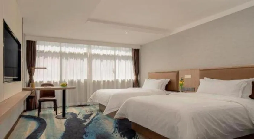 Bed in GreenTree Inn Ganzhou Sankang Temple DaRunFa Express Hotel