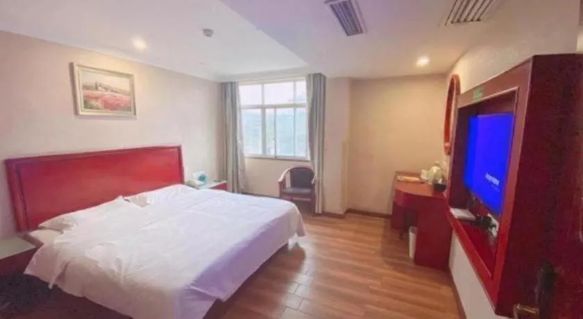 Bed in GreenTree Inn Ganzhou Sankang Temple DaRunFa Express Hotel