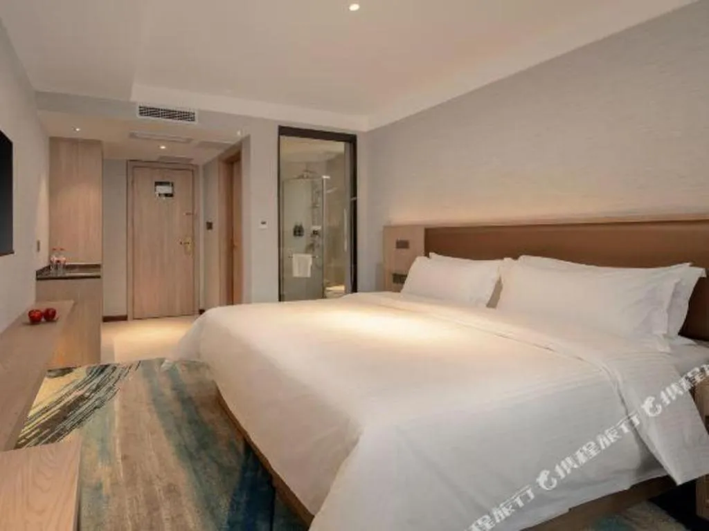 Bed in GreenTree Inn Ganzhou Sankang Temple DaRunFa Express Hotel