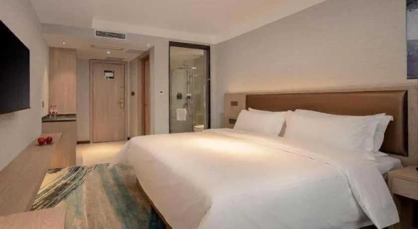 Bed in GreenTree Inn Ganzhou Sankang Temple DaRunFa Express Hotel