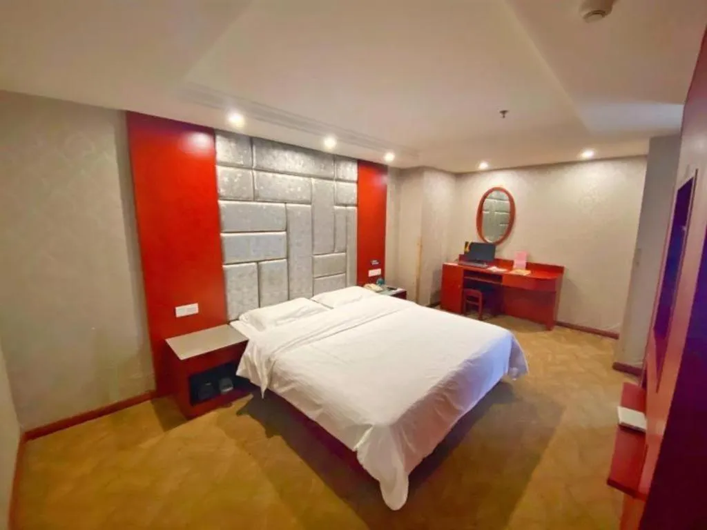 Bed in GreenTree Inn Ganzhou Sankang Temple DaRunFa Express Hotel