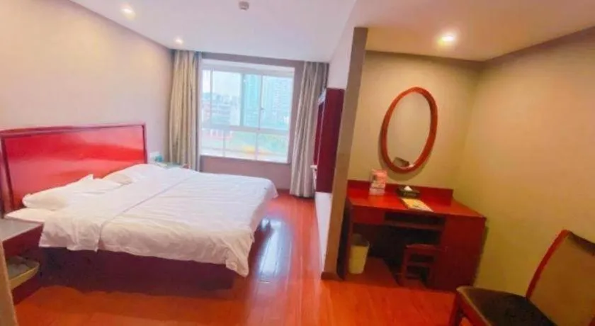 Bed in GreenTree Inn Ganzhou Sankang Temple DaRunFa Express Hotel