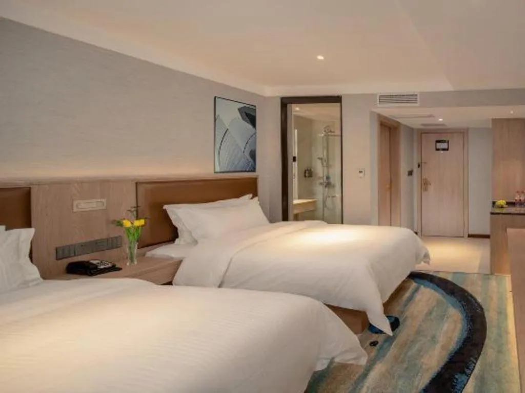 Bed in GreenTree Inn Ganzhou Sankang Temple DaRunFa Express Hotel