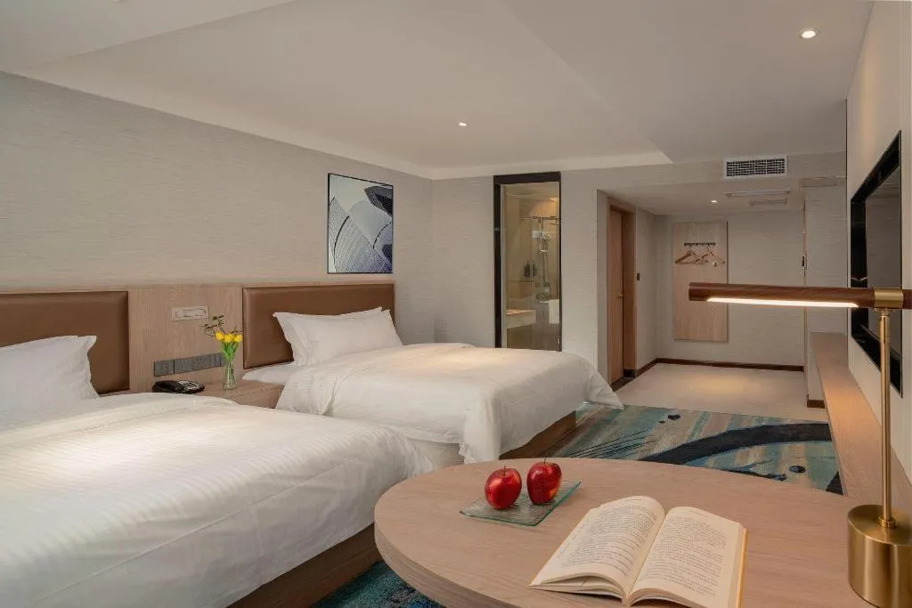 Bed in GreenTree Inn Ganzhou Sankang Temple DaRunFa Express Hotel