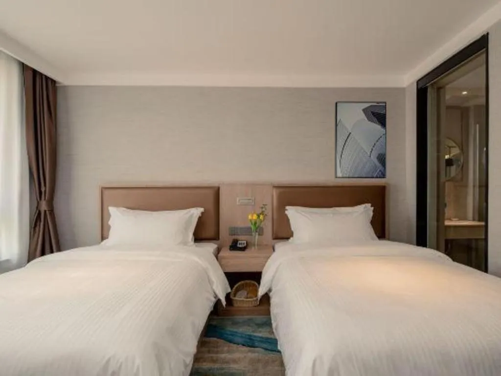 Bed in GreenTree Inn Ganzhou Sankang Temple DaRunFa Express Hotel