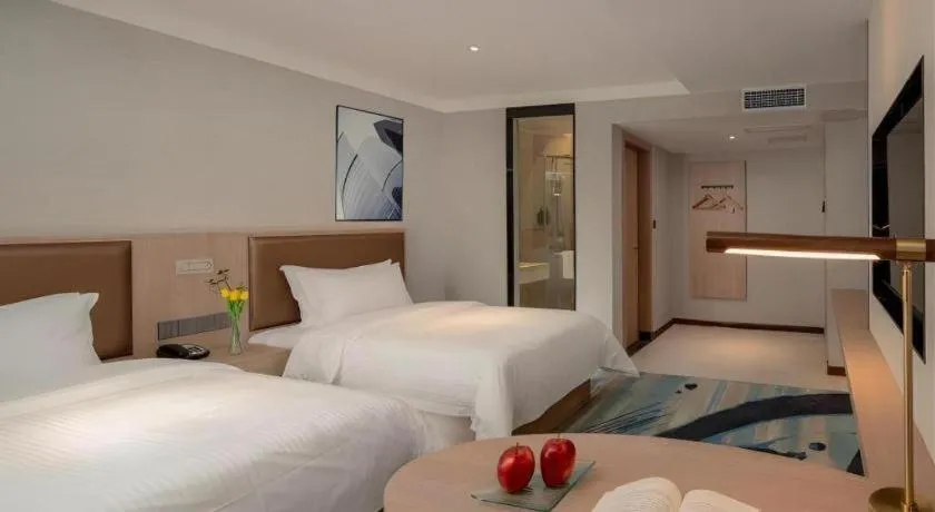 Bed in GreenTree Inn Ganzhou Sankang Temple DaRunFa Express Hotel