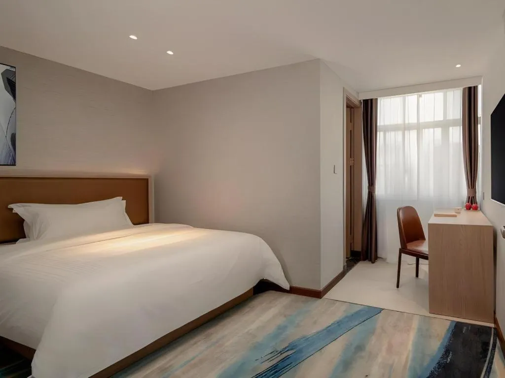 Bed in GreenTree Inn Ganzhou Sankang Temple DaRunFa Express Hotel