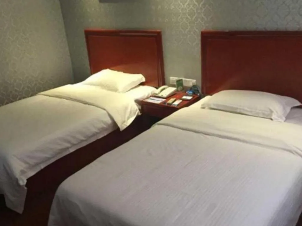 Bed in GreenTree Inn Ganzhou Sankang Temple DaRunFa Express Hotel