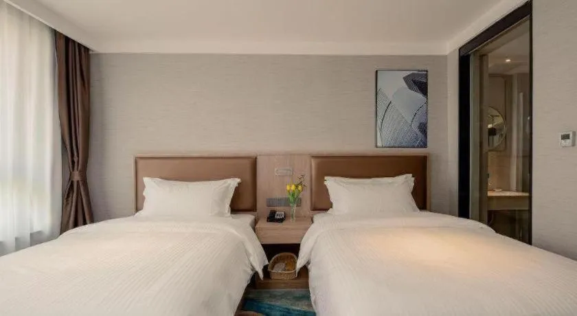 Bed in GreenTree Inn Ganzhou Sankang Temple DaRunFa Express Hotel