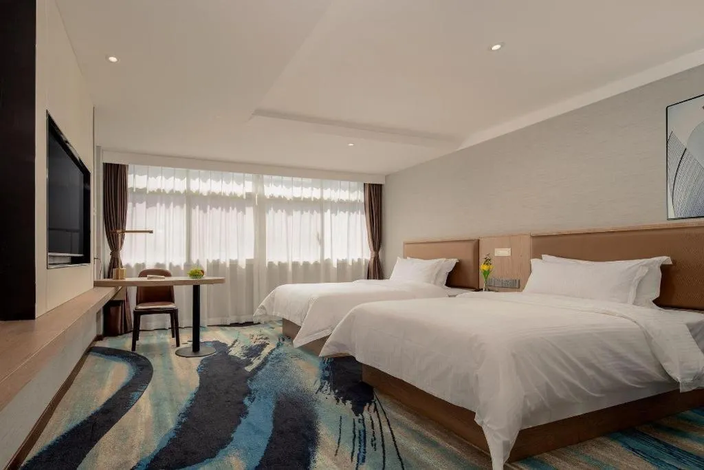 Bed in GreenTree Inn Ganzhou Sankang Temple DaRunFa Express Hotel