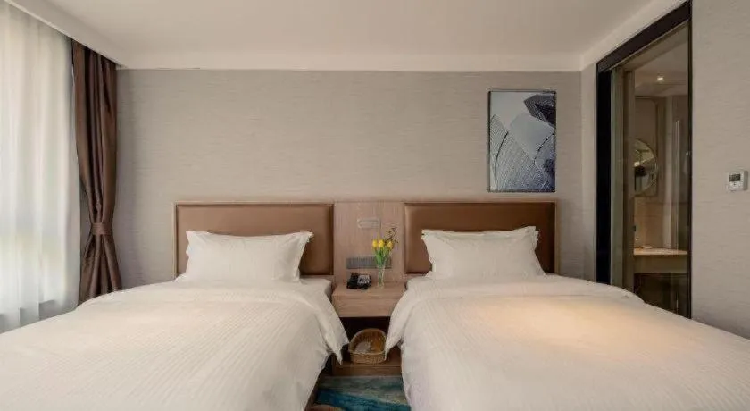 Bed in GreenTree Inn Ganzhou Sankang Temple DaRunFa Express Hotel