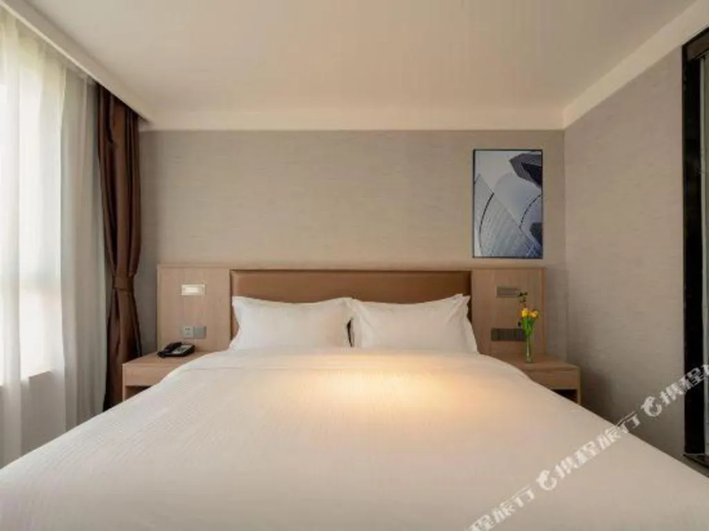 Bed in GreenTree Inn Ganzhou Sankang Temple DaRunFa Express Hotel