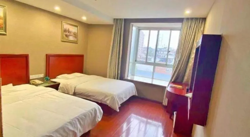 Bed in GreenTree Inn Ganzhou Sankang Temple DaRunFa Express Hotel