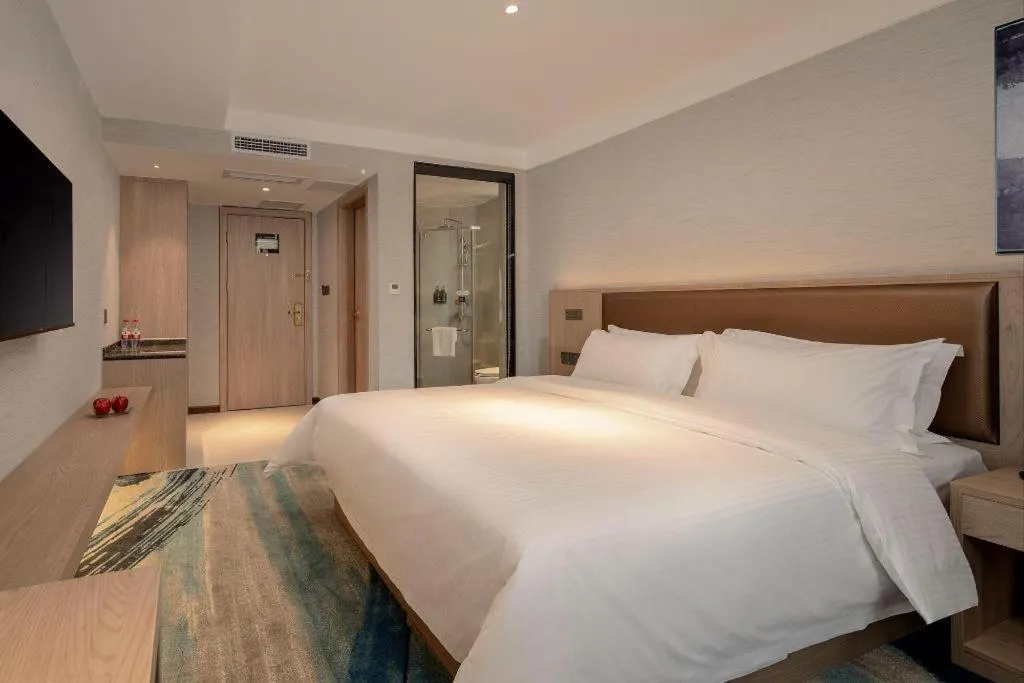 Bed in GreenTree Inn Ganzhou Sankang Temple DaRunFa Express Hotel