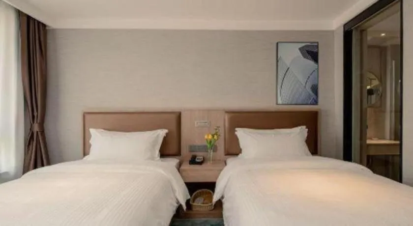 Bed in GreenTree Inn Ganzhou Sankang Temple DaRunFa Express Hotel