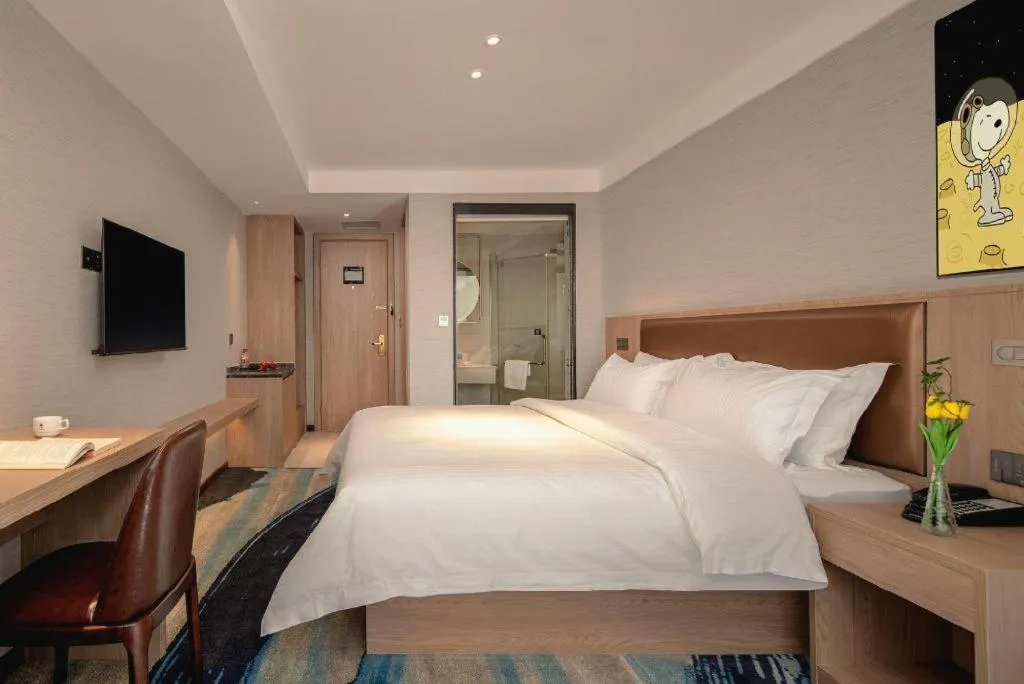 Bed in GreenTree Inn Ganzhou Sankang Temple DaRunFa Express Hotel