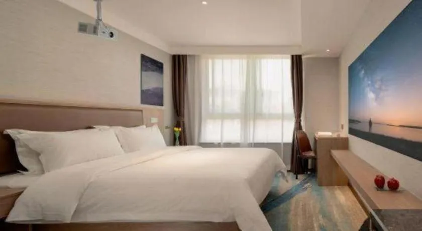 Bed in GreenTree Inn Ganzhou Sankang Temple DaRunFa Express Hotel