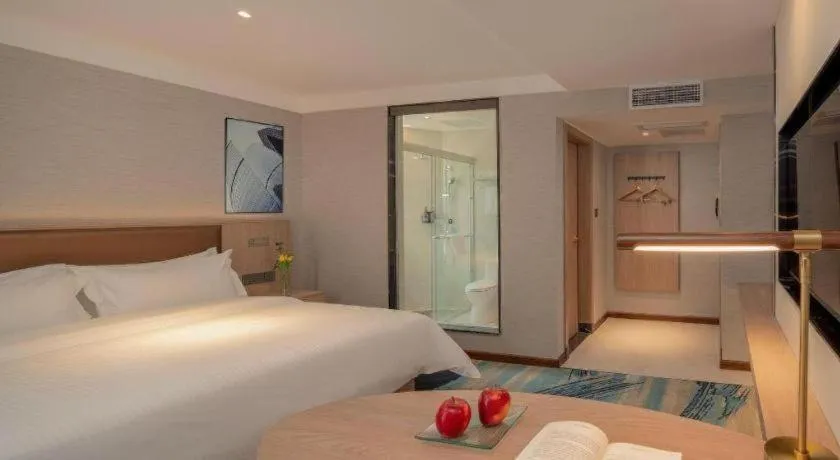 Bed in GreenTree Inn Ganzhou Sankang Temple DaRunFa Express Hotel