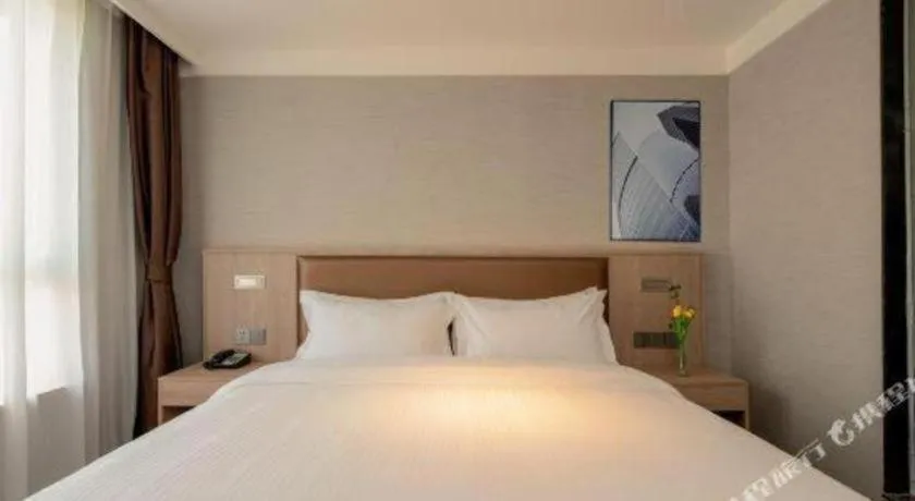 Bed in GreenTree Inn Ganzhou Sankang Temple DaRunFa Express Hotel