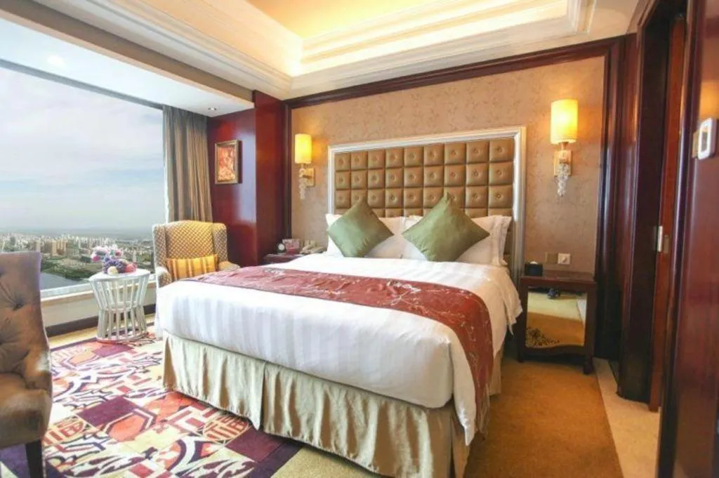 Bed in Shenyang Royal Wan Xin Hotel