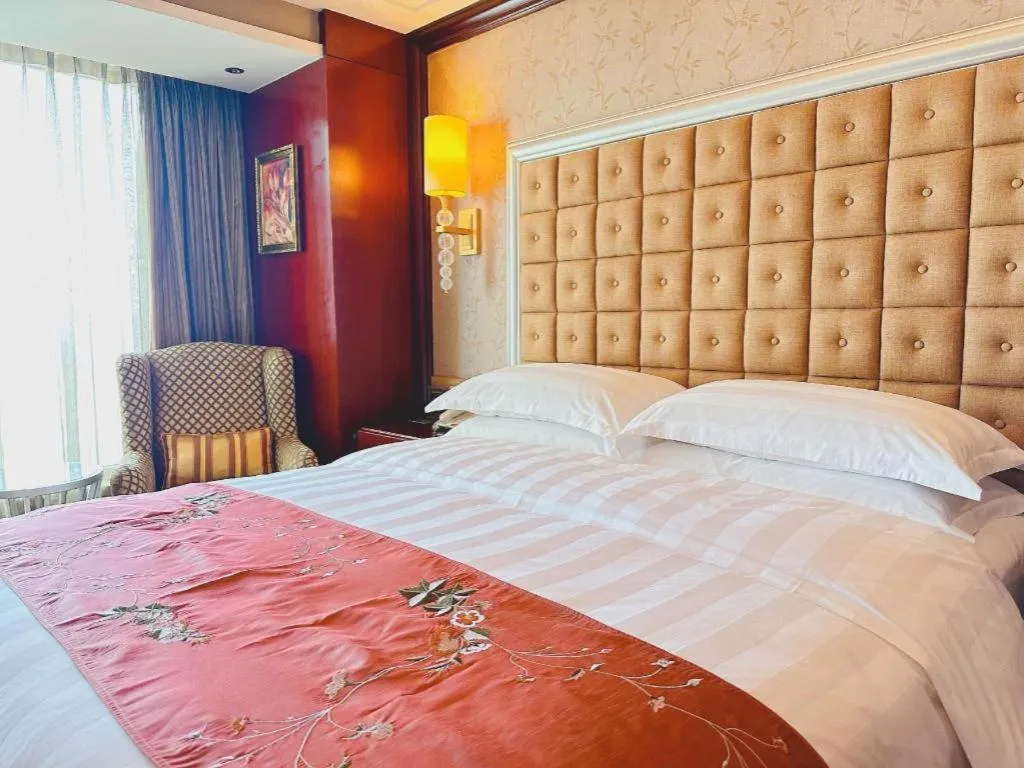 Bed in Shenyang Royal Wan Xin Hotel