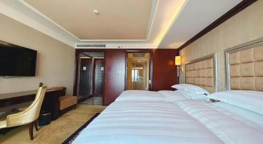 Bed in Shenyang Royal Wan Xin Hotel