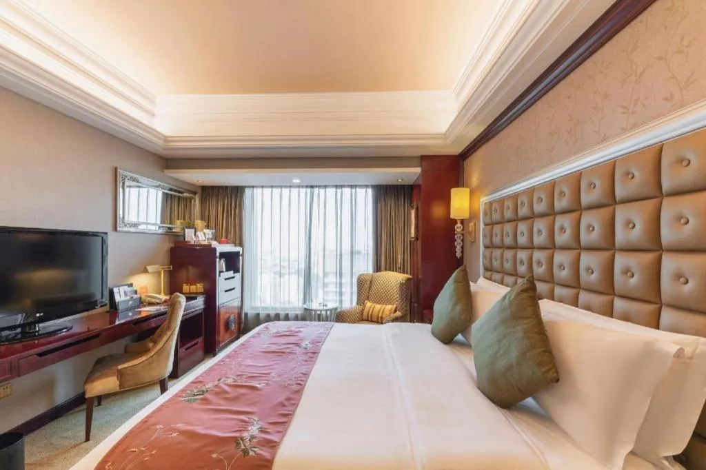 Bed in Shenyang Royal Wan Xin Hotel