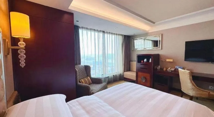 Bed in Shenyang Royal Wan Xin Hotel