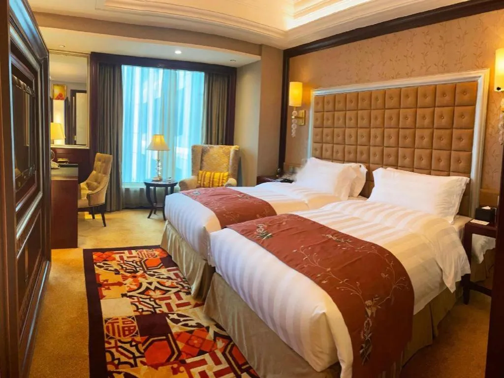 Bed in Shenyang Royal Wan Xin Hotel