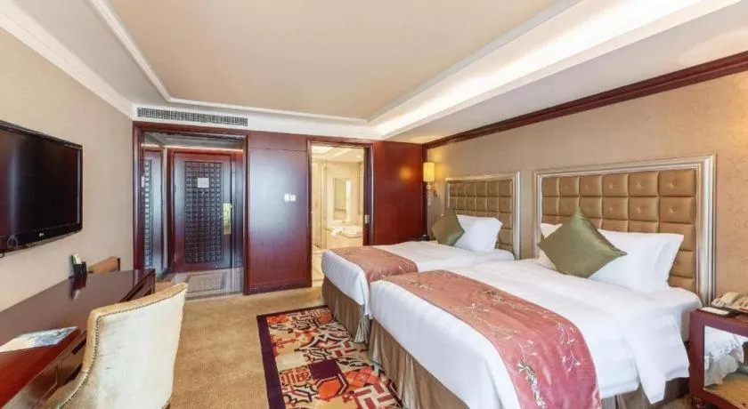 Bed in Shenyang Royal Wan Xin Hotel