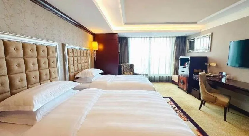 Bed in Shenyang Royal Wan Xin Hotel
