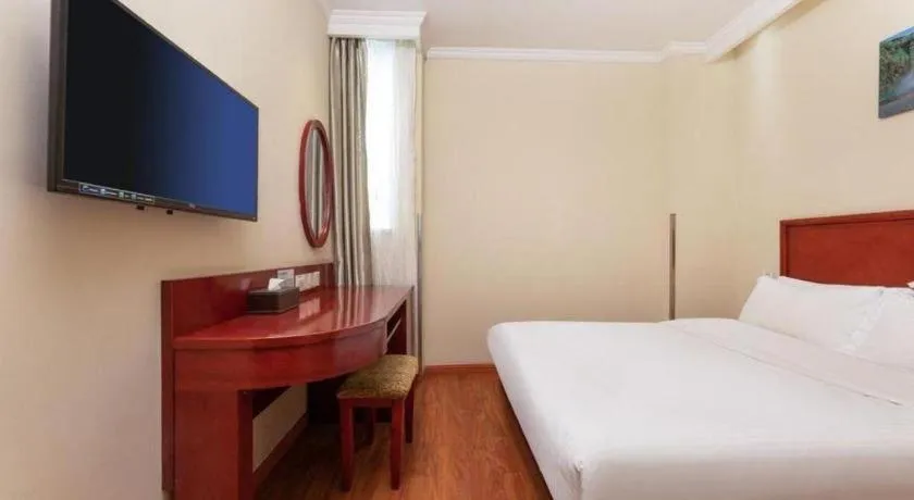Bed in GreenTree Inn Suzhou Railway Station North Square Haobainian Wedding Dress City Express Hotel