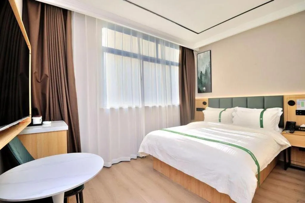 Bed in GreenTree Inn Suzhou Shihu Suli Road Express Hotel