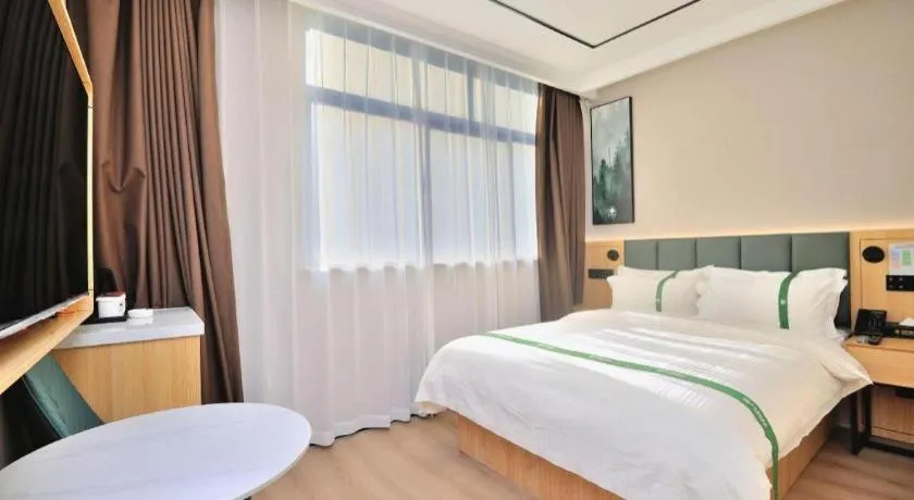Bed in GreenTree Inn Suzhou Shihu Suli Road Express Hotel