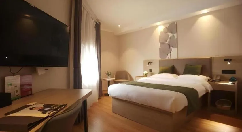 Bed in GreenTree Inn Xuzhou High Speed Railway Station Express Hotel