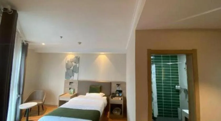 Bed in GreenTree Inn Xuzhou High Speed Railway Station Express Hotel