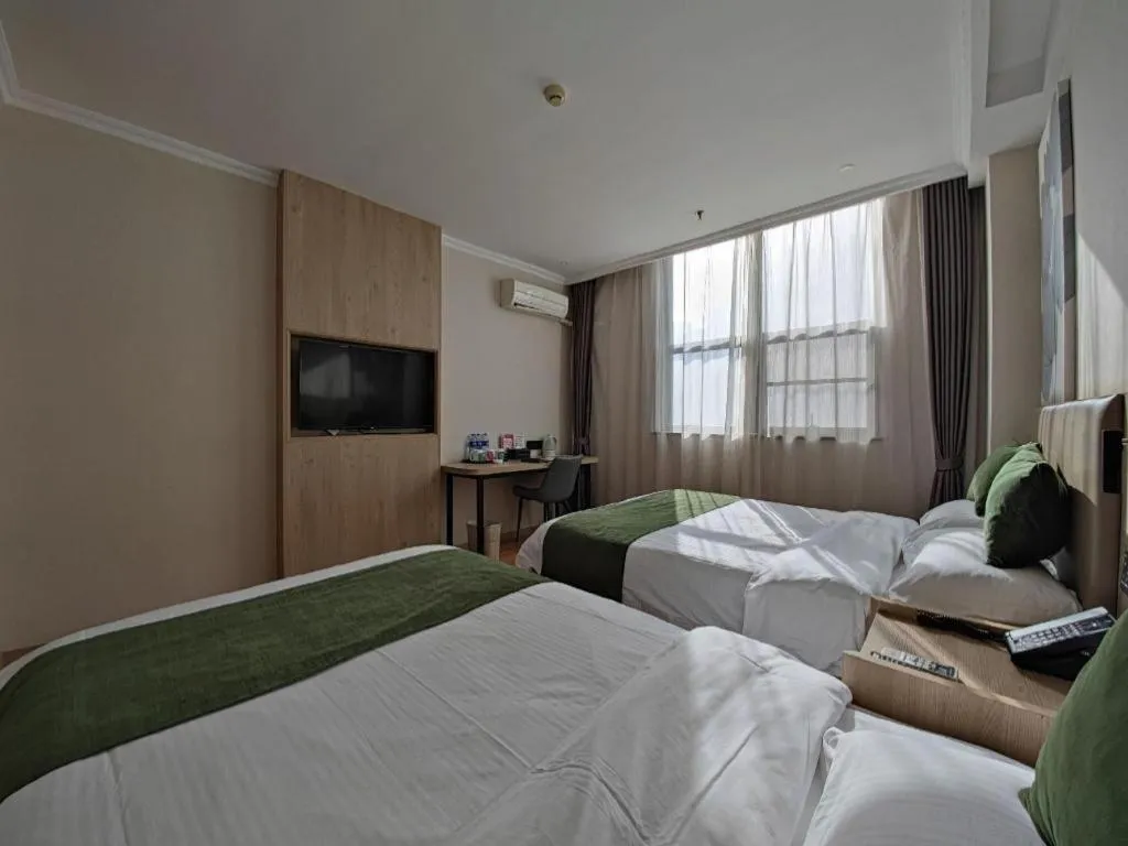 Bed in GreenTree Inn Xuzhou High Speed Railway Station Express Hotel