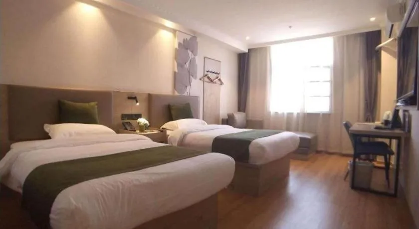 Bed in GreenTree Inn Xuzhou High Speed Railway Station Express Hotel