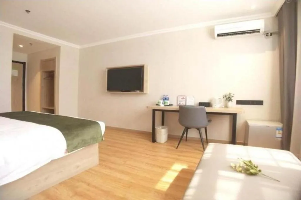 Bed in GreenTree Inn Xuzhou High Speed Railway Station Express Hotel