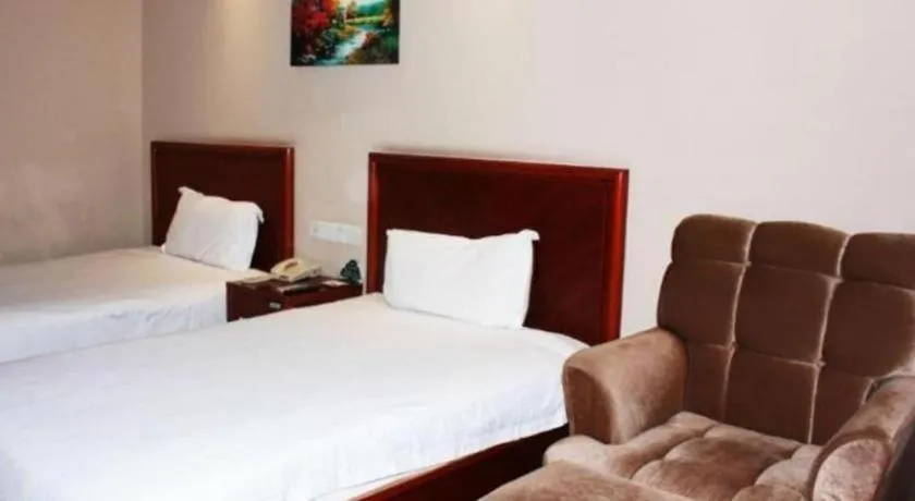 Bed in GreenTree Inn Xuzhou High Speed Railway Station Express Hotel