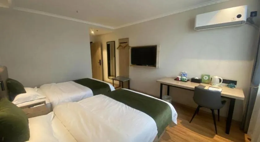 Bed in GreenTree Inn Xuzhou High Speed Railway Station Express Hotel