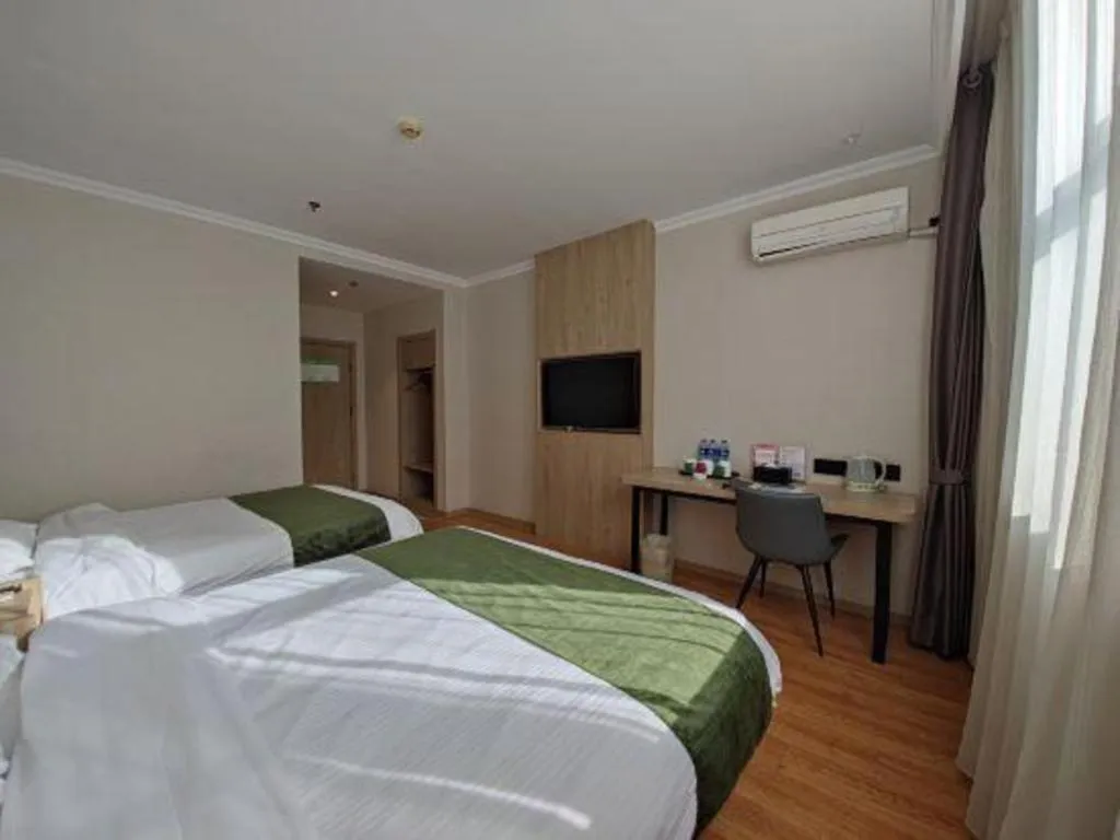 Bed in GreenTree Inn Xuzhou High Speed Railway Station Express Hotel