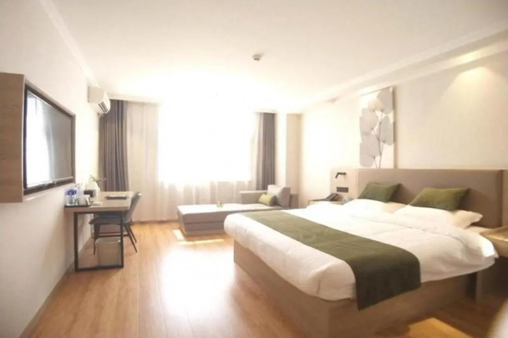 Bed in GreenTree Inn Xuzhou High Speed Railway Station Express Hotel