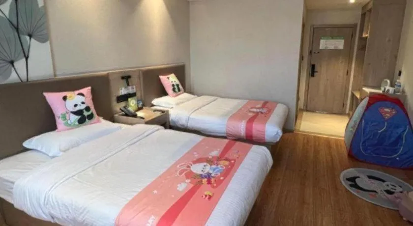 Bed in GreenTree Inn Xuzhou High Speed Railway Station Express Hotel