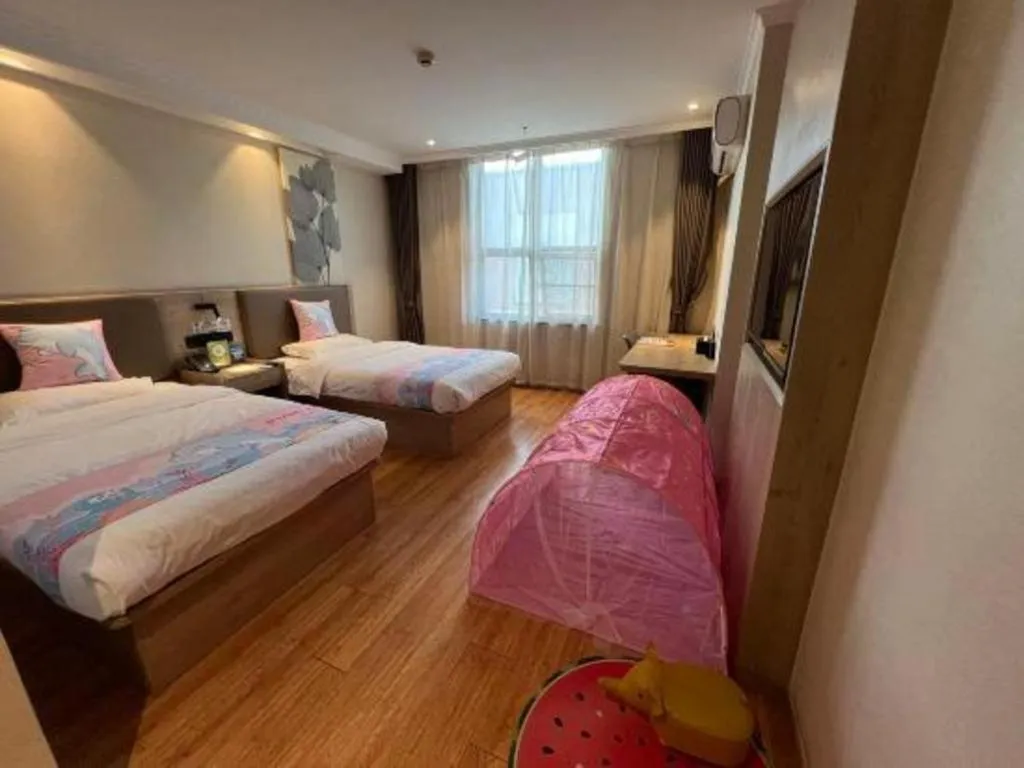 Bed in GreenTree Inn Xuzhou High Speed Railway Station Express Hotel