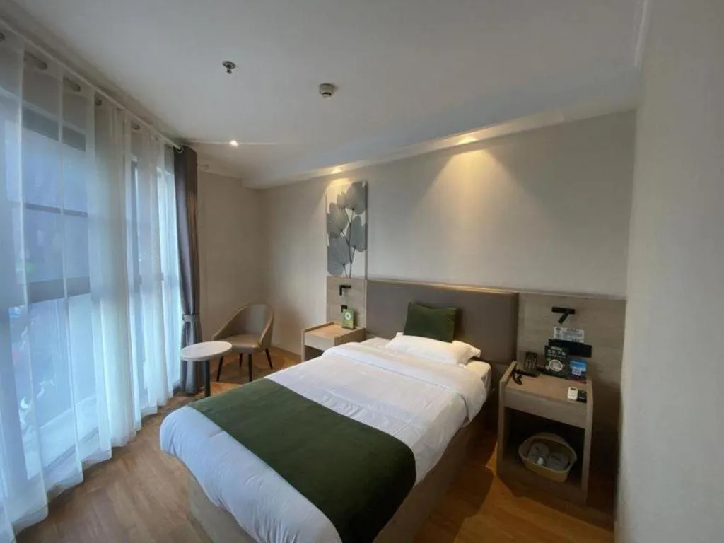 Bed in GreenTree Inn Xuzhou High Speed Railway Station Express Hotel