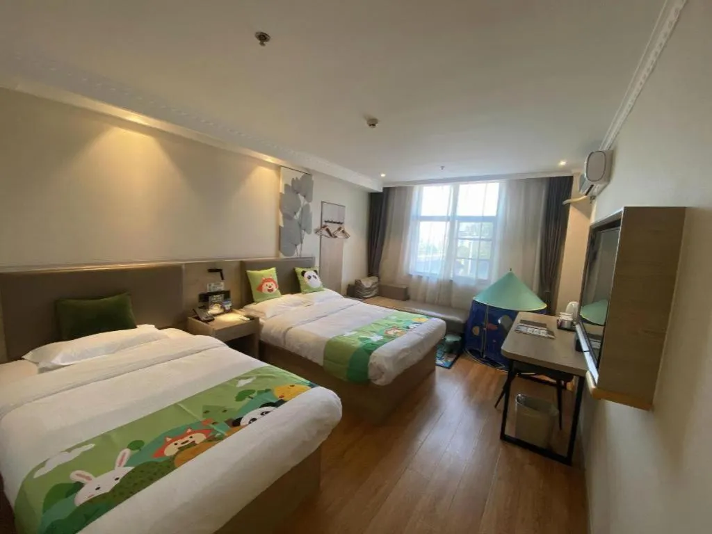 Bed in GreenTree Inn Xuzhou High Speed Railway Station Express Hotel