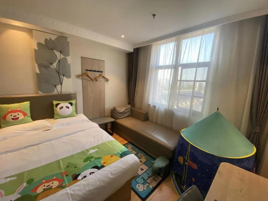 Bed in GreenTree Inn Xuzhou High Speed Railway Station Express Hotel