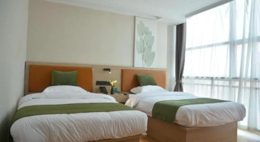 Bed in GreenTree Inn Xuzhou High Speed Railway Station Express Hotel
